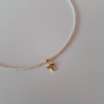 Κολιέ με πέρλες και σταυρό από ατσάλι